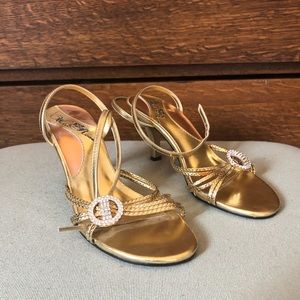 Gold strapped heels